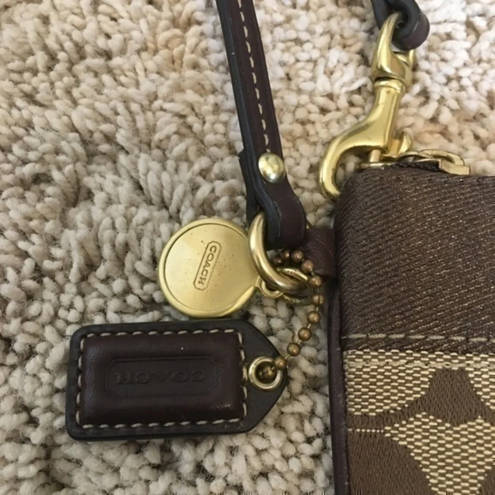 Coach Khaki signature stripe wristlet